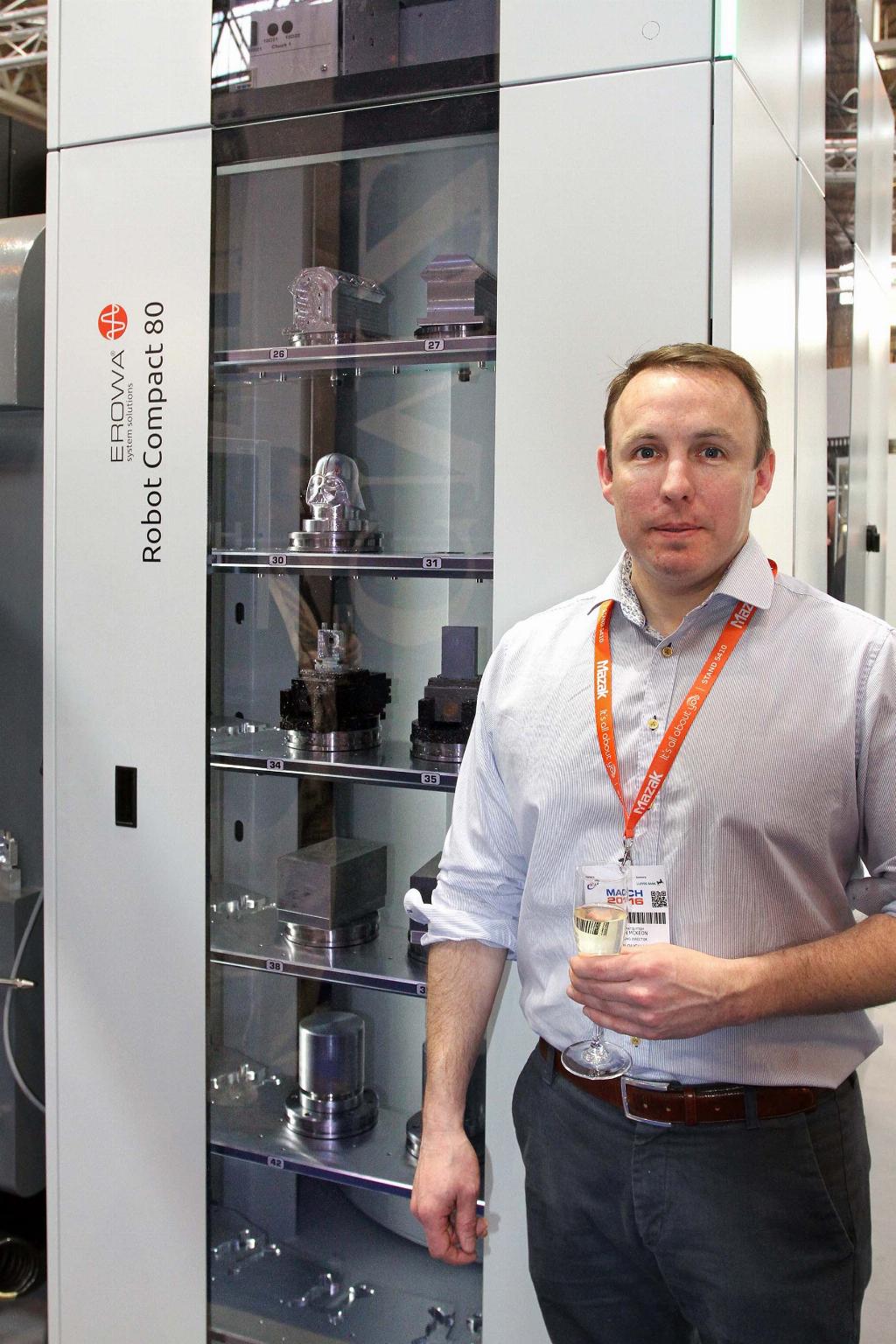 Brian McKeon, managing Director, Dawnlough in front of the Erowa Robot Compact 80 robotic pallet change system that will feed two Hurco VMX30UHSi 5-axis, high-speed machining centres at his Galway factory