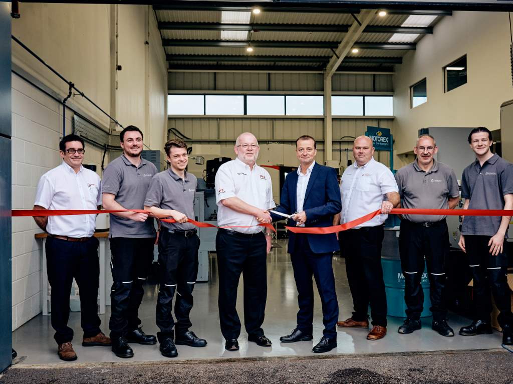 Open for business: Nigel Atherton (centre left), XYZ Machine Tools’ managing director and Tony Pennington, Ceratizit UK & Ireland managing director performing official ribbon cutting duties 