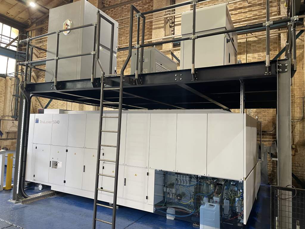 TLCC has built a mezzanine above the machine to provide a platform for the resonator, cooler and other ancillary equipment