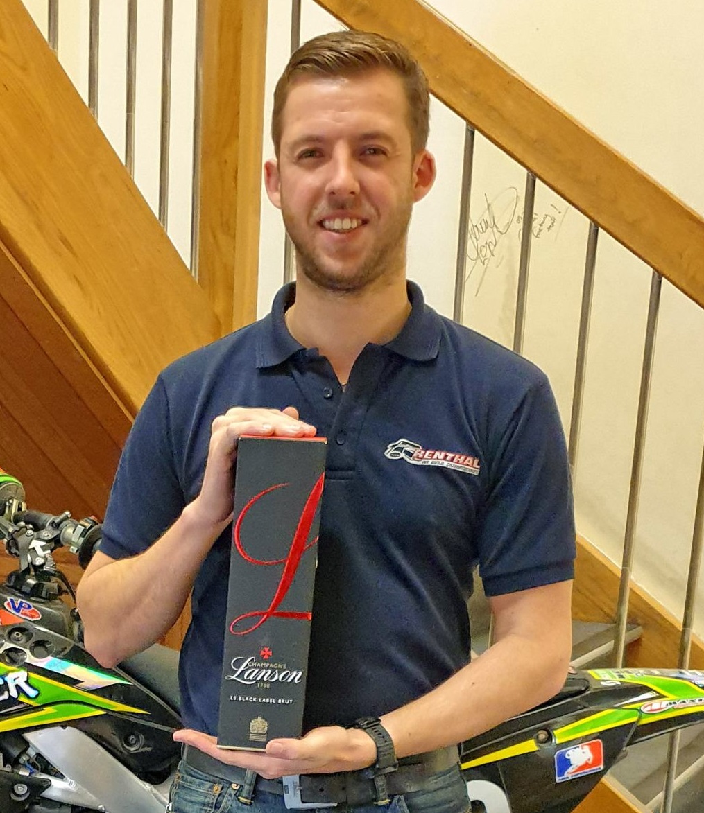 Raphael Poulequin of Renthal won a bottle of champagne for achieving the fastest lap on the F1 car simulator at Citizen Machinery's open house