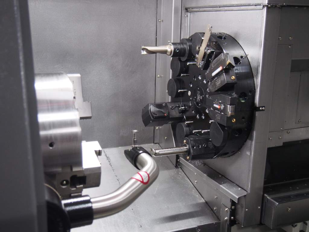 View of driven tools and tool setting arm