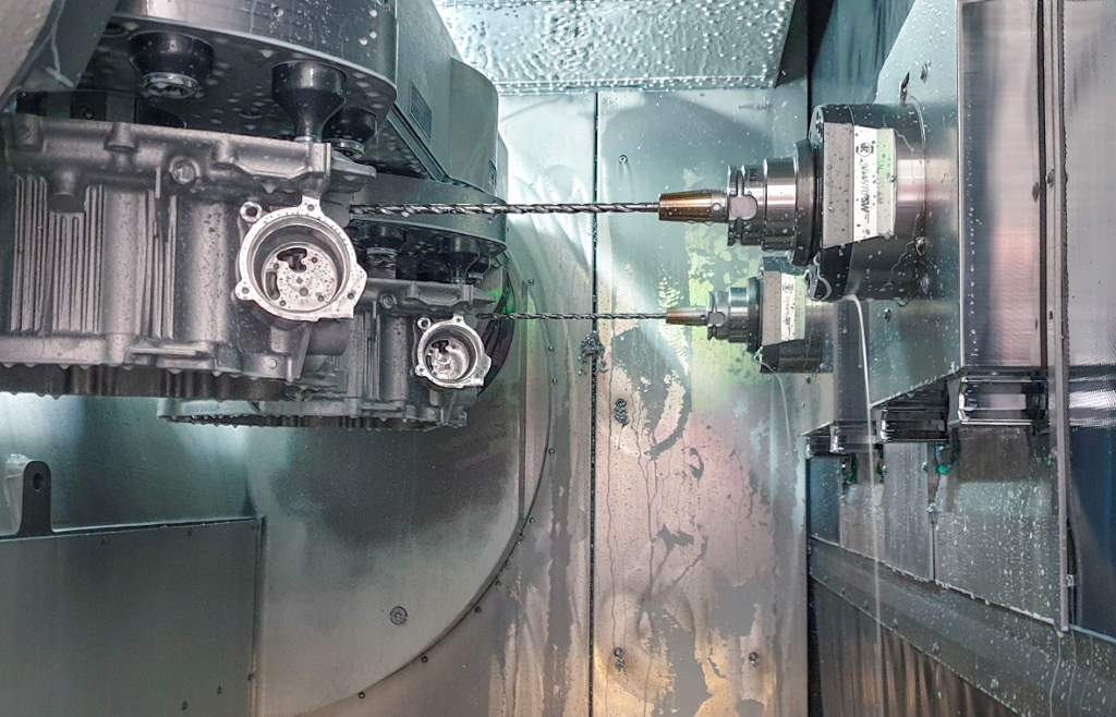 Deep drilling is one of the machining steps that takes place on the double-spindle machine. Holes 180mm and 141mm deep are created with 8mm drills from Mapal