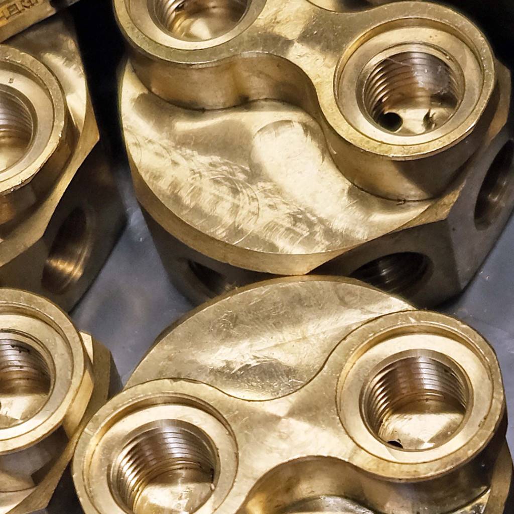 Brass components machined from bar in the Index G200