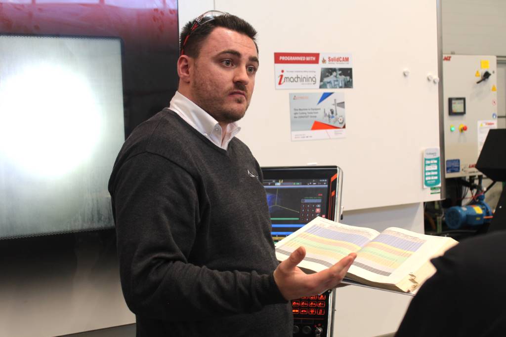 Application sales engineer Rob Thornton explaining the machining calculations with customers on the interactive demonstrations